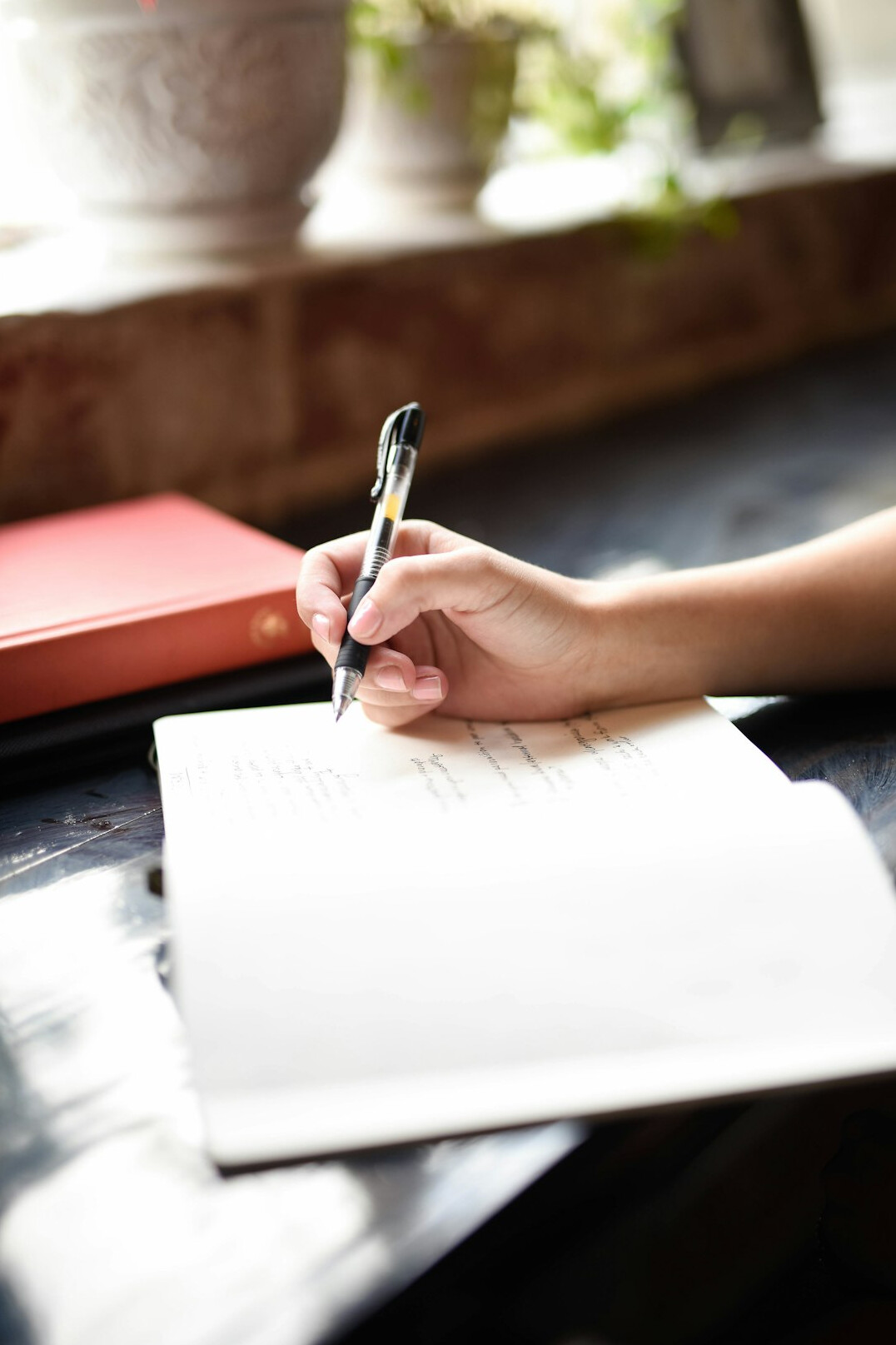 writer editing manuscript